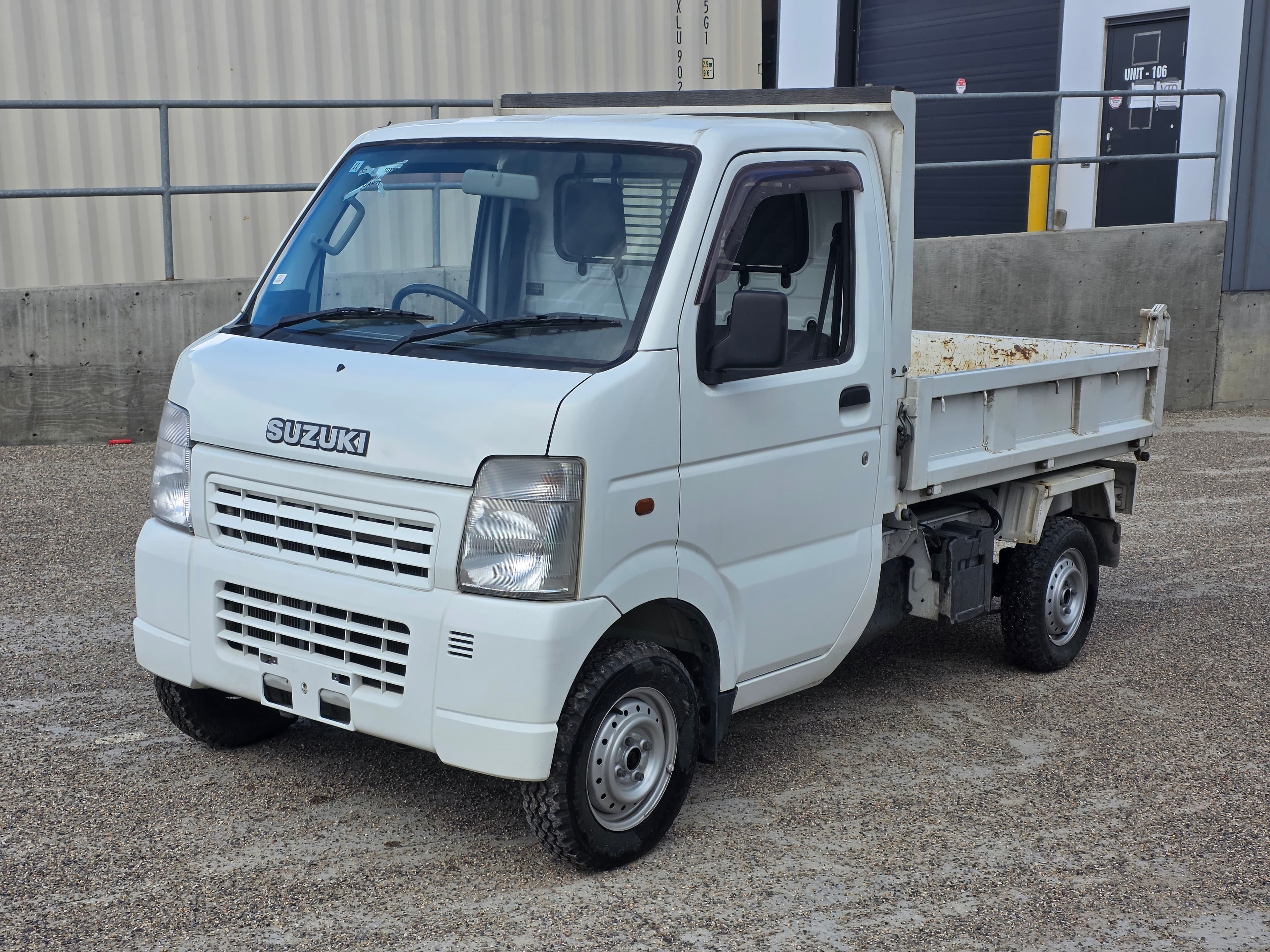 2005 Suzuki Carry Dump 4WD 5-Speed Manual kei truck for sale Calgary — photo 1 of 27