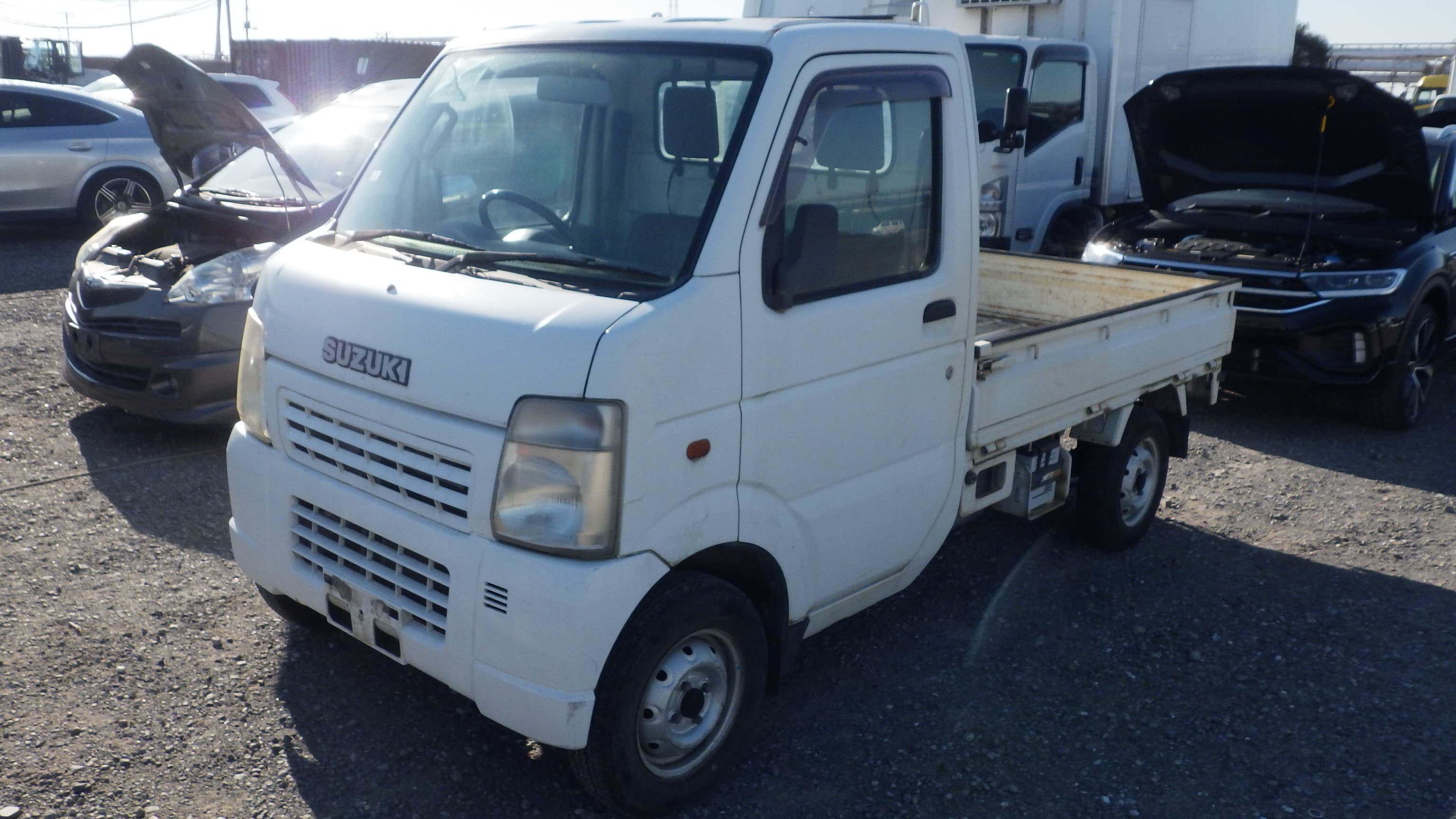 2005 Suzuki Carry Truck Flatbed 4WD 5-Speed Manual with DIFF LOCK — kei truck for sale in Calgary