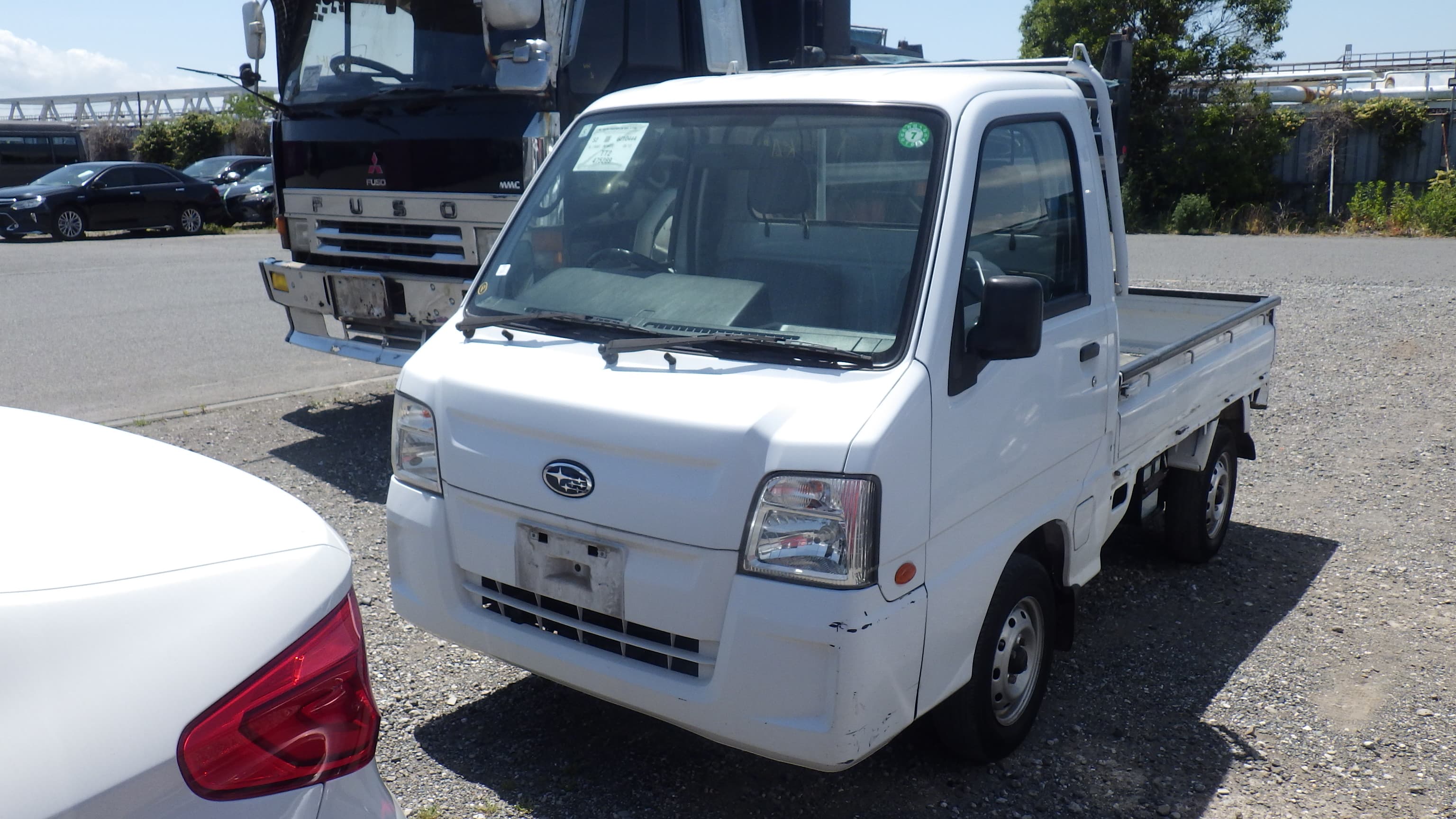2010 Subaru Sambar Truck Flatbed 4WD 5-Speed Manual kei truck for sale Calgary — photo 1 of 15